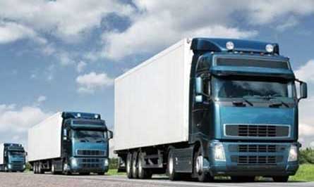 Trucks driving on road